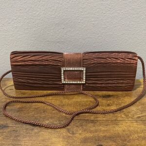 Metallic Bronze Fabric Evening Bag With Strap And Rhinestone Buckle On The Front